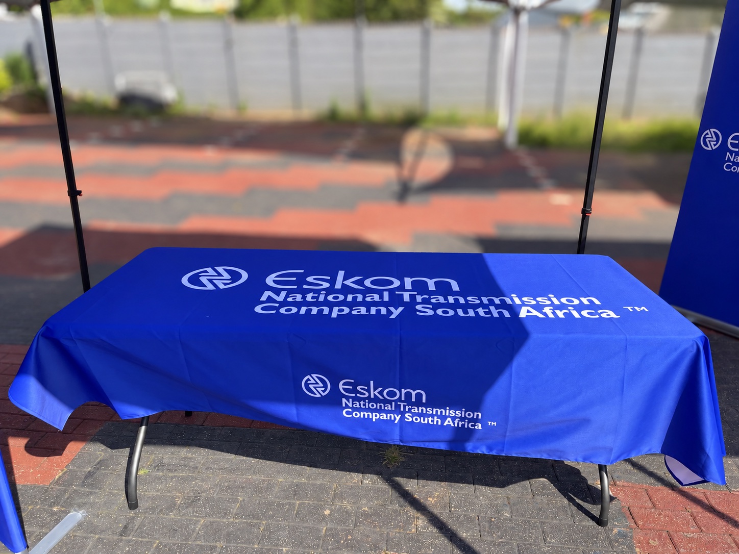 Branded event table with a fitted Eskom table covering